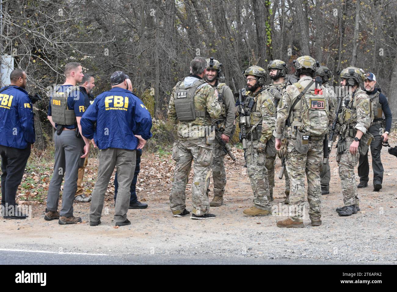 Helmetta, United States. 09th Nov, 2023. FBI agents sweep the property