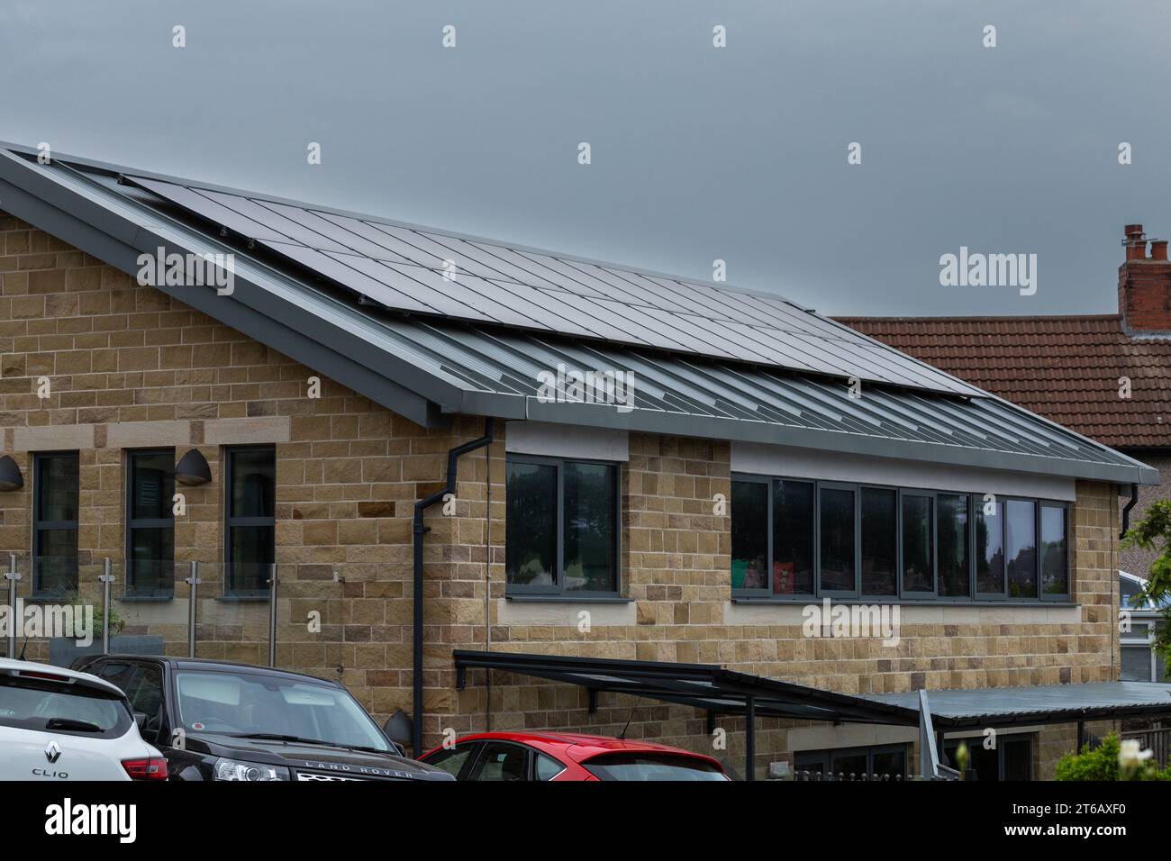 Solar Panels (PV panels) on the roof of Baildon Methodist Church. This  is a forward looking church that cares for the environment. Stock Photo