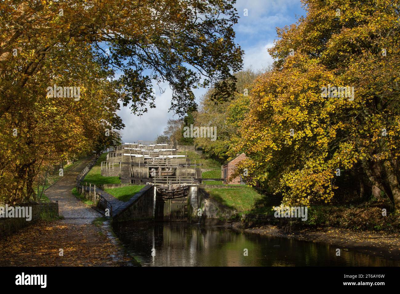 Five Rise Locks on the Leeds Liverpool Canal in Bingley, Yorkshire, in the Autumn. The locks are the steepest staircase locks in the country. Stock Photo