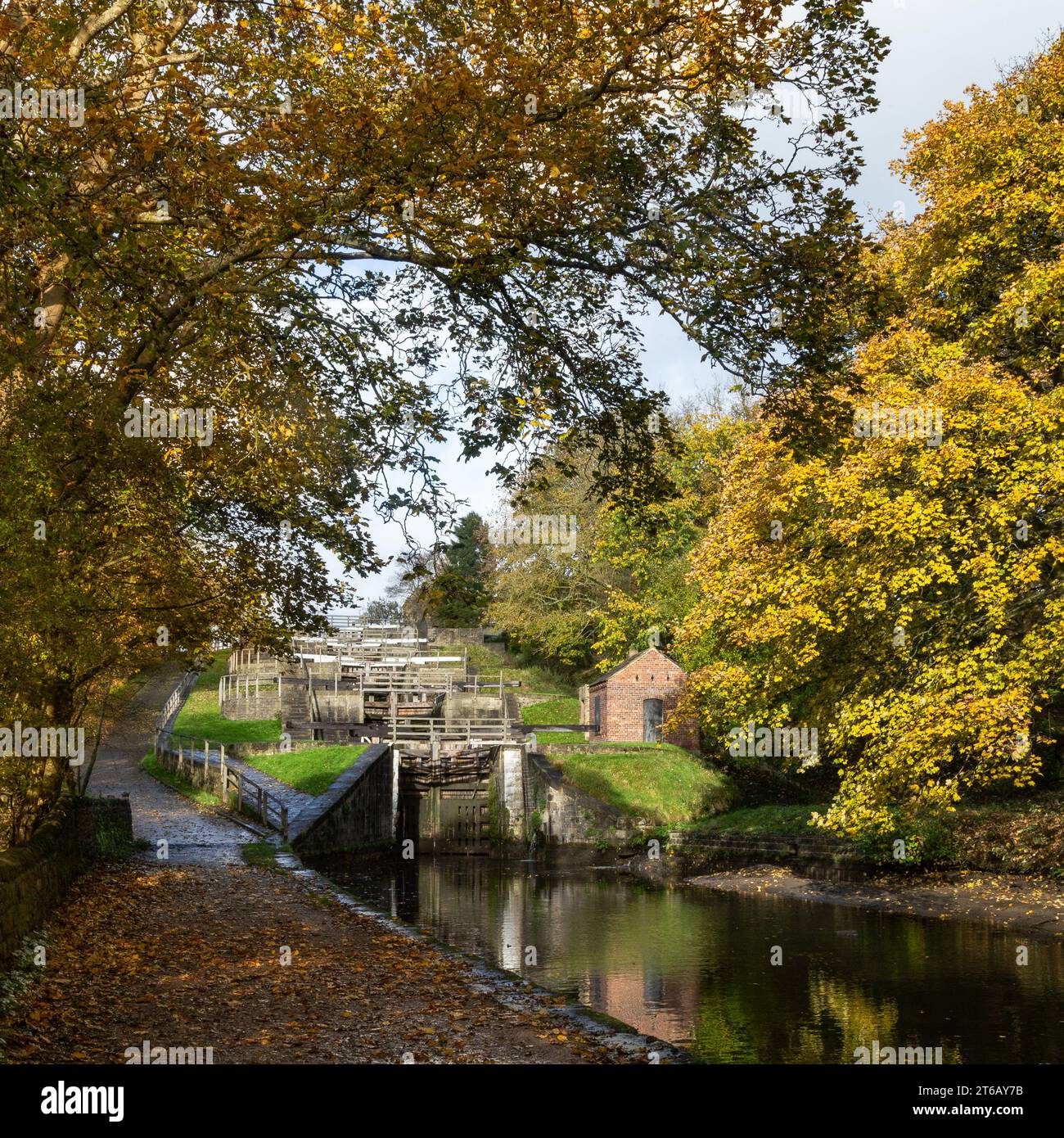 Five Rise Locks on the Leeds Liverpool Canal in Bingley, Yorkshire, in the Autumn. The locks are the steepest staircase locks in the country. Stock Photo