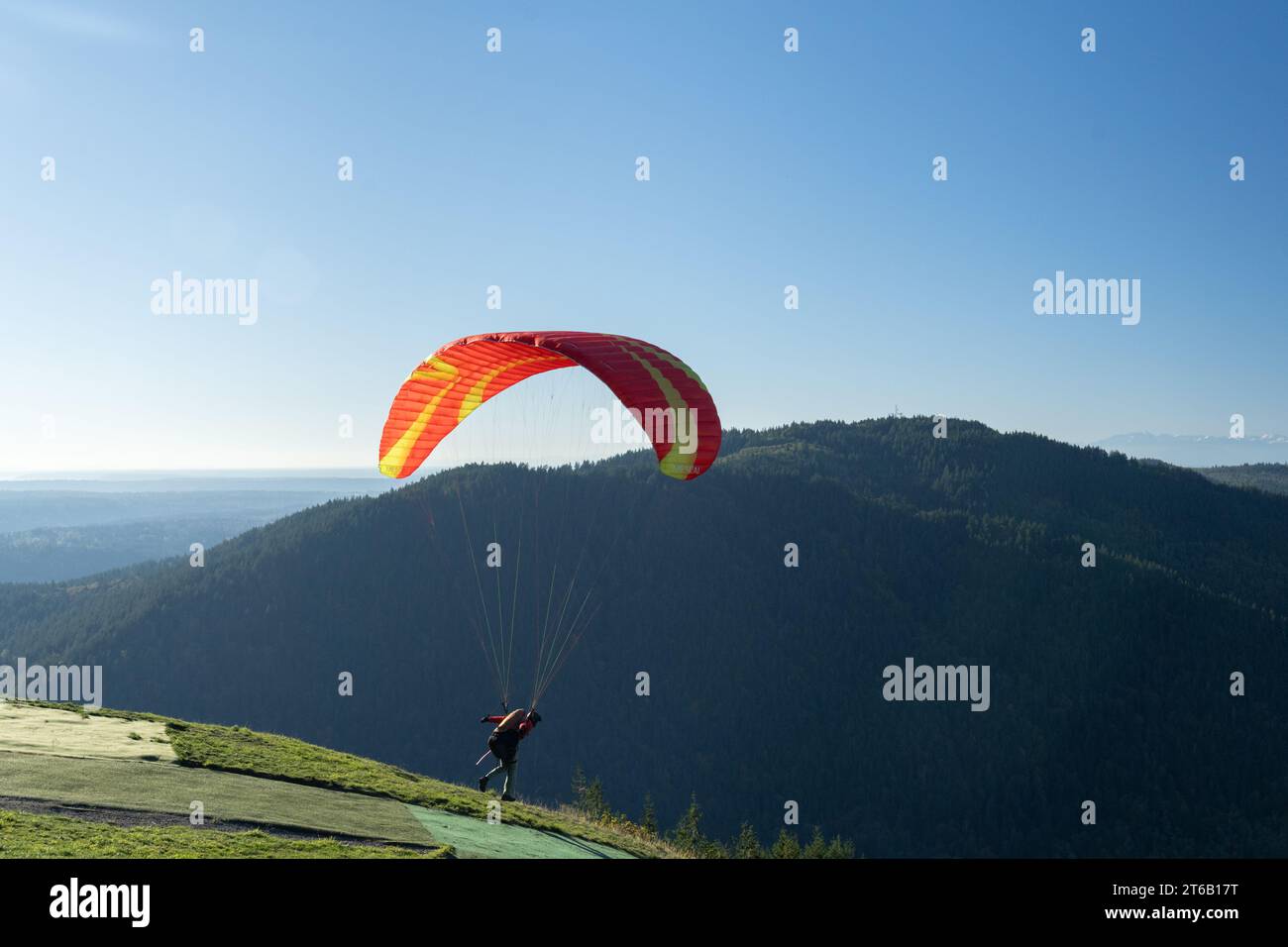 Paragliders launching from Poo Poo Point, in Tiger Mountain State