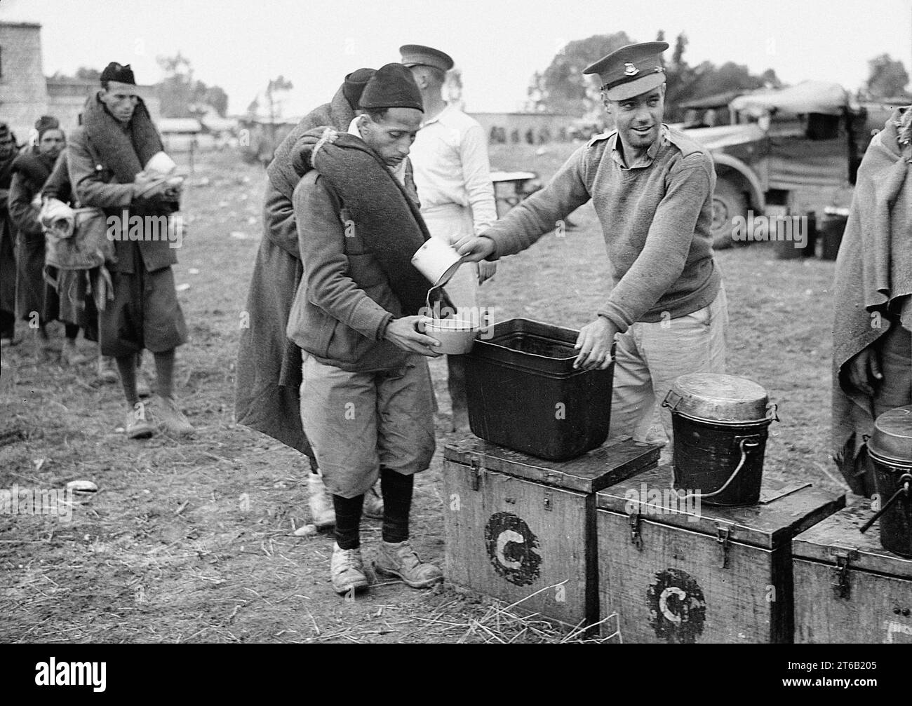 Italian prisoners of war being fed after detraining at Wadi al-Sarar ...