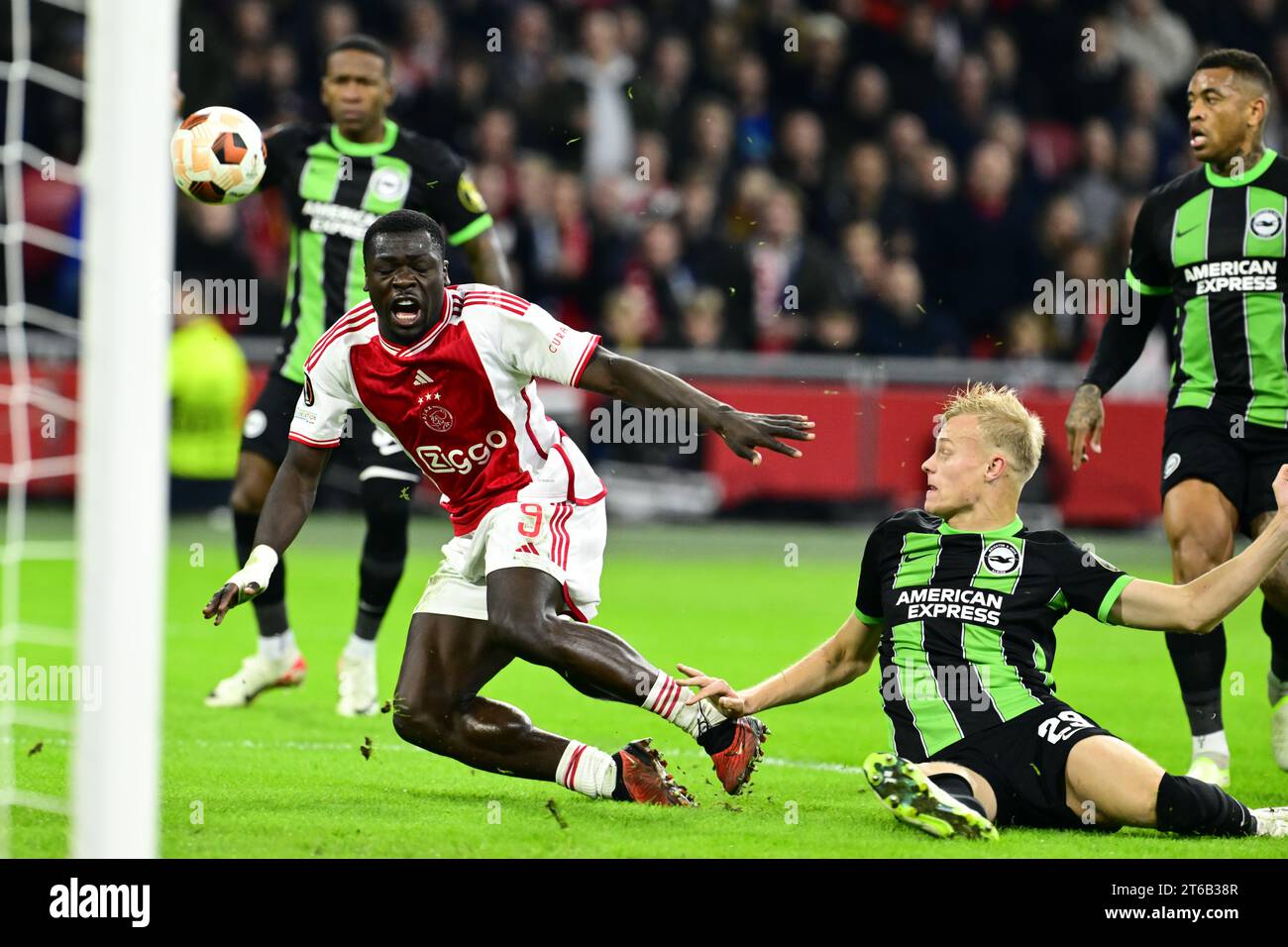 AMSTERDAM (lr) Brian Brobbey of Ajax, JanPaul van Hecke of Brighton Hove Albion during the AMSTERDAM (lr) Brian Brobbey of Ajax, JanPaul van Hecke of Brighton Hove Albion during the