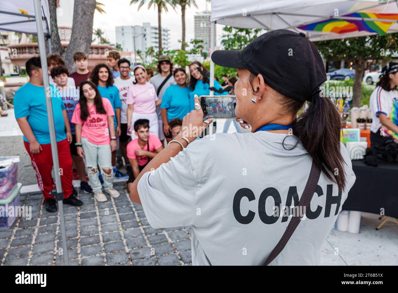 Miami Beach Florida,Normandy Isle Fountain plaza,annual Halloween community event activities,youth boxing club coach,taking making photo group posing, Stock Photo