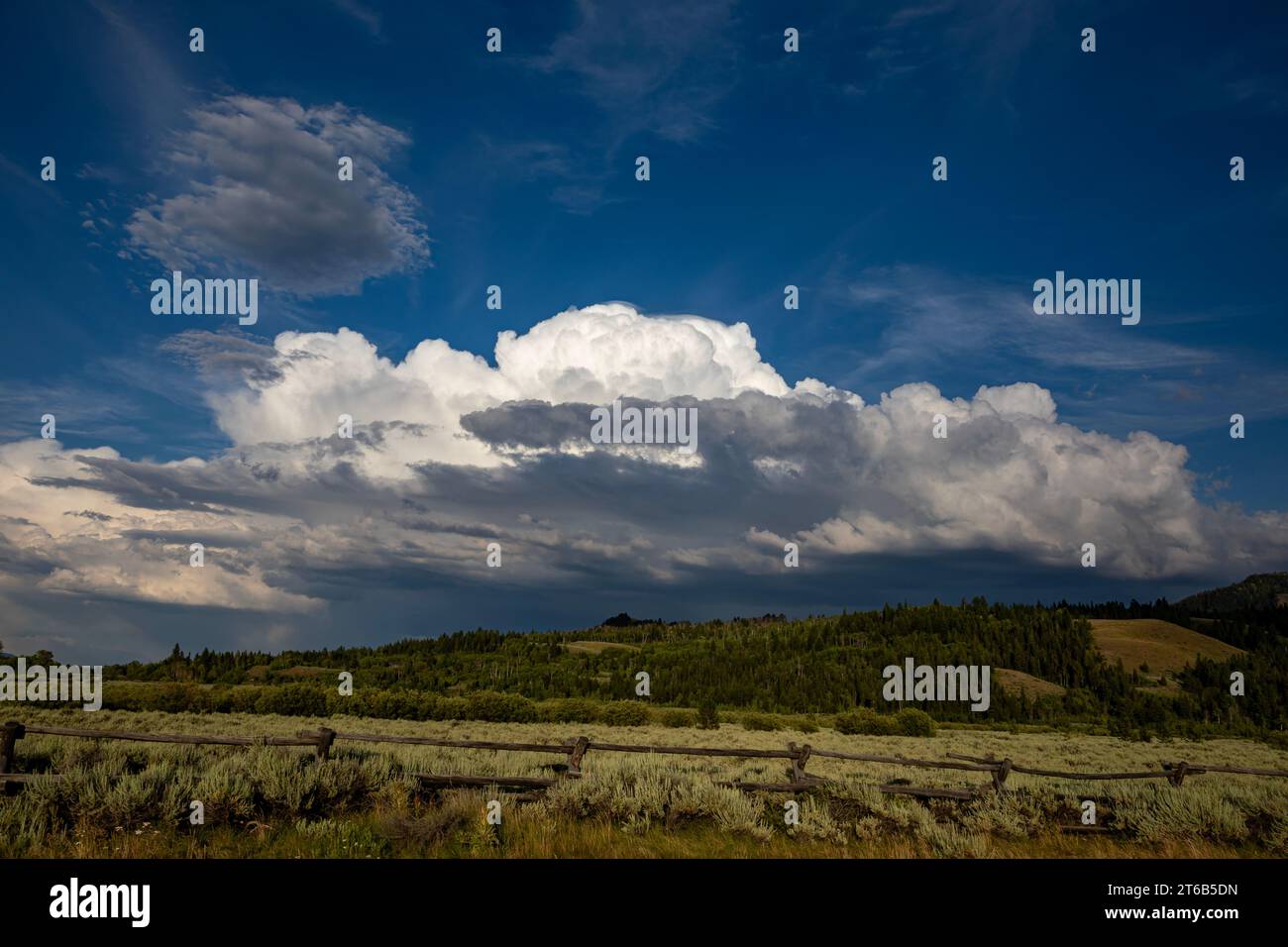 WY05763-00...WYOMING - Clouds forming over the prairie at the Cunningham Cabin historical area in Grand Teton National Park. Stock Photo