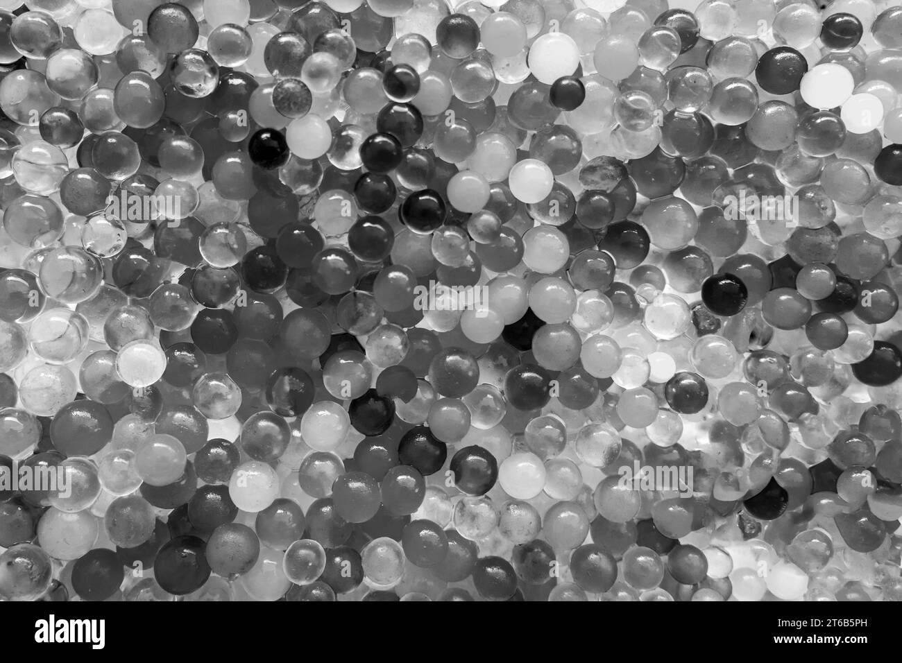 The texture is a lot of different balls. Set of orbeez. Many orbits. Black and white photo Stock Photo