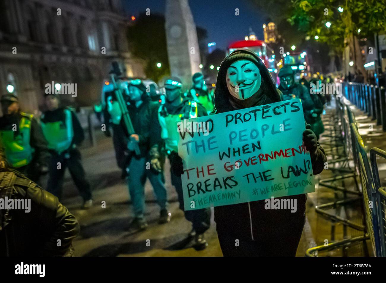 'Million Mask March' anti-government activists march through Westminster on 5th November. London, UK Stock Photo