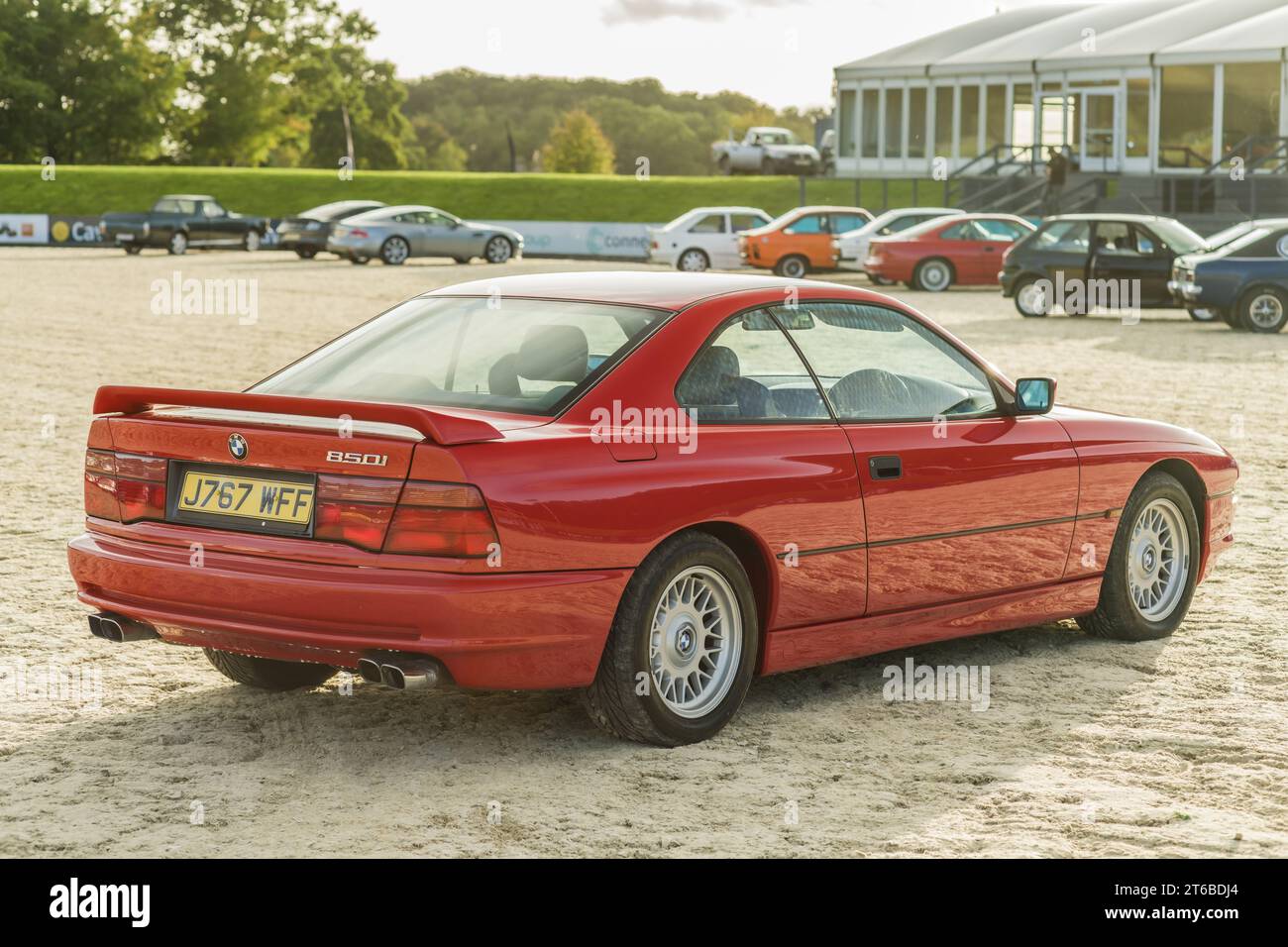 Chester, Cheshire, England, September 29th 2023. Red BMW 8 Series displayed at Bolesworth Castle, automotive lifestyle editorial illustration. Stock Photo