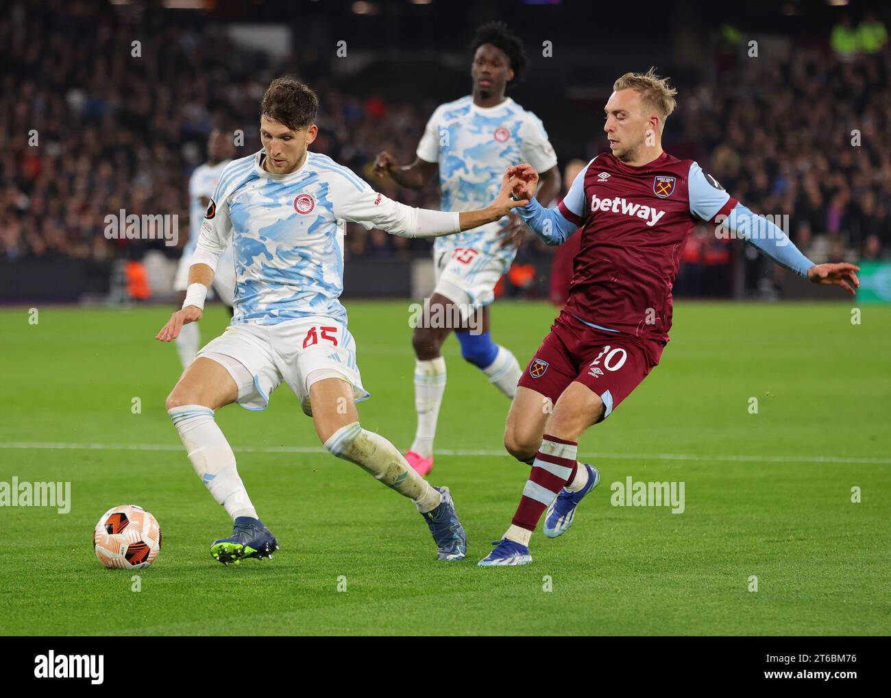 London, UK. 9th Nov, 2023. Panagiotis Retsos of Olympiakos tackles Jarrod Bowen of West Ham United during the UEFA Europa League match at the London Stadium, London. Picture credit should read: Paul Terry/Sportimage Credit: Sportimage Ltd/Alamy Live News Stock Photo