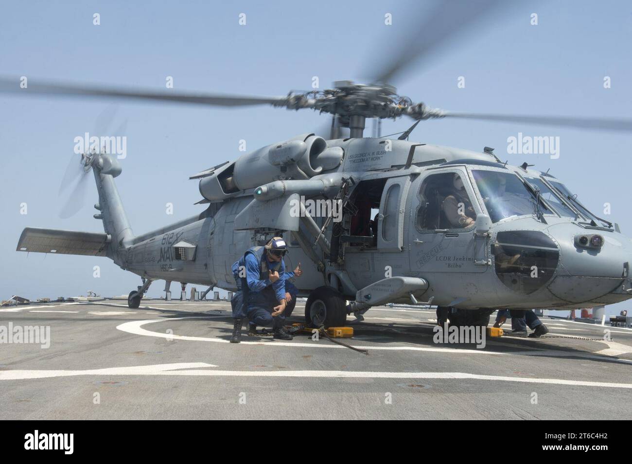 USS Arleigh Burke flight deck operations 140730 Stock Photo - Alamy