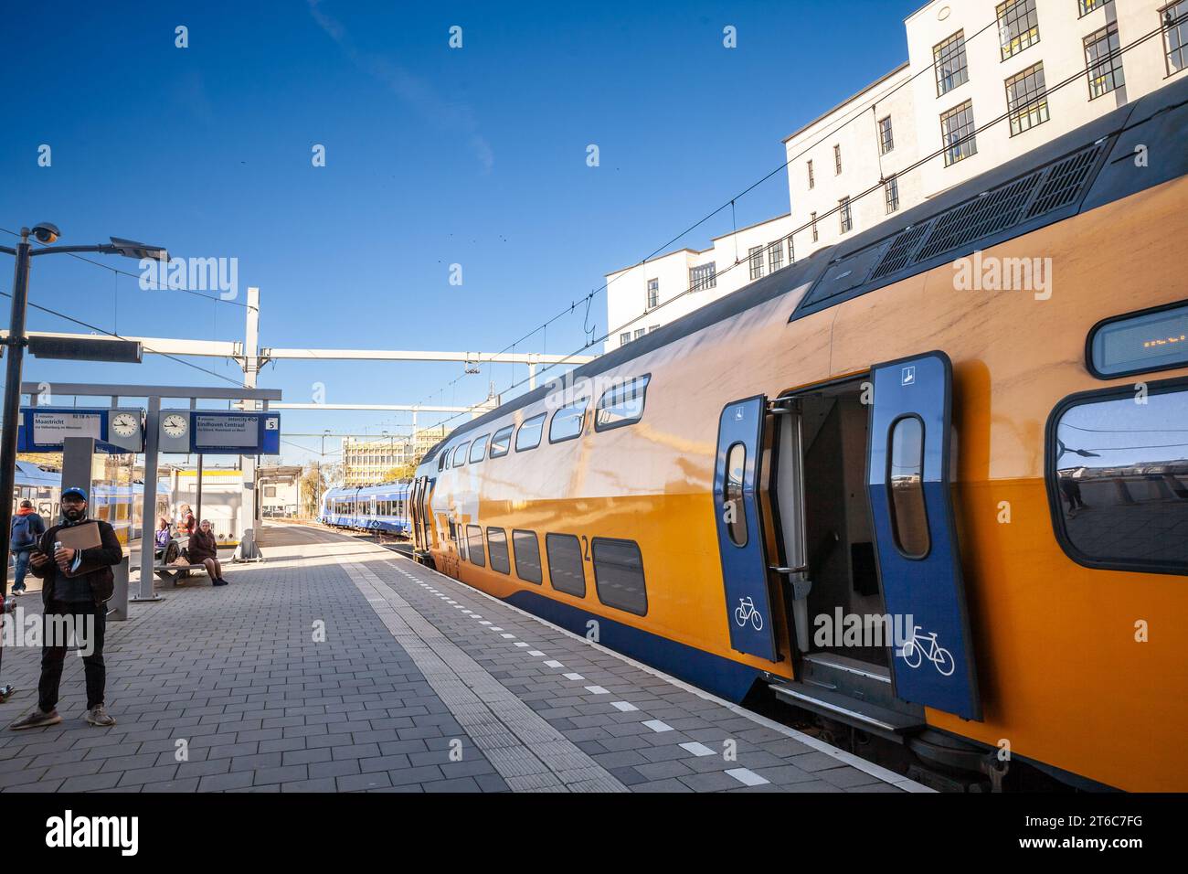 Picture of a train of Dutch railways ready for departure. Heerlen railway station is located in Heerlen in Limburg, Netherlands. Stock Photo