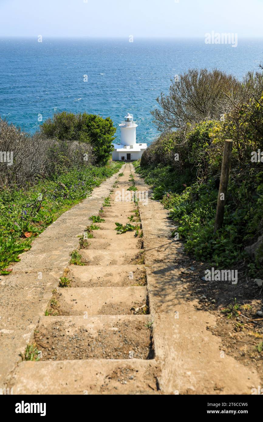 The steep path down to the Tater Du Lighthouse near to Lamorna Cove, Cornwall, West Country, England, UK Stock Photo