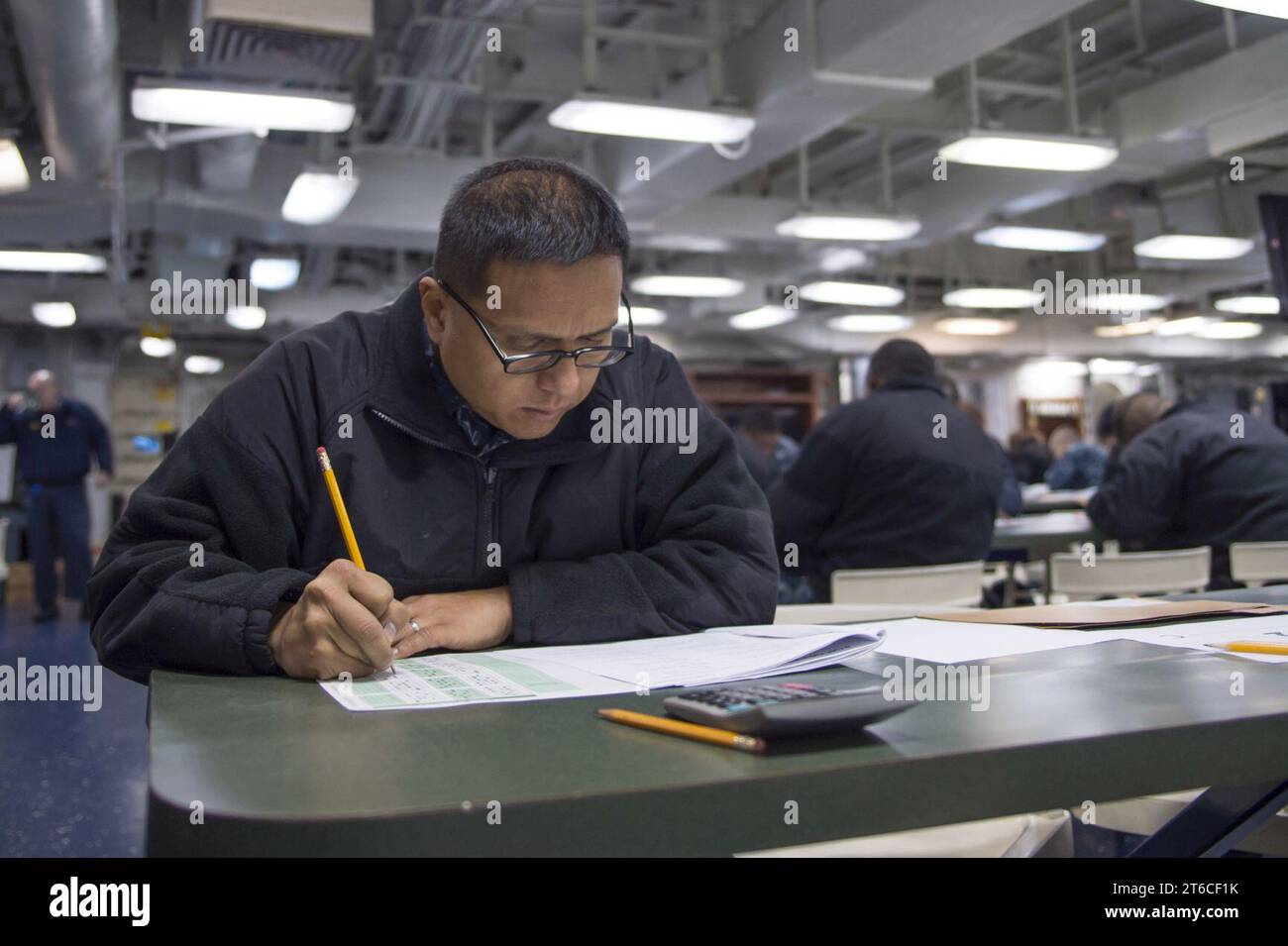 USS Bonhomme Richard (LHD 6) E-7 Advancement Exam 2017 170119 Stock Photo