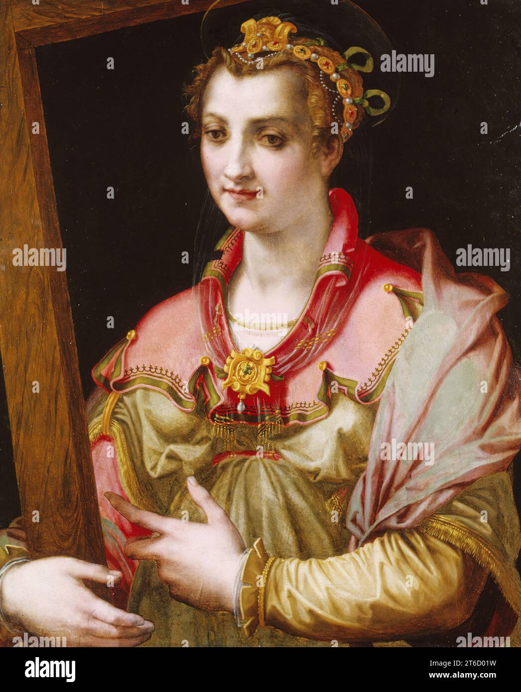 Saint Helena, c1575. St. Helena (ca. 247-ca. 327) was the mother of Emperor Constantine the Great (ca. 288-337), who, according to tradition, christianized the Roman Empire. Helena is shown holding the True Cross (the cross on which Christ was crucified), which she is said to have discovered in Jerusalem. Her elaborate headdress and idealized, slightly masculine facial features reveal the artist's study of Michelangelo's so-called &quot;teste divine&quot; (&quot;divine heads&quot;), admired for their great beauty. Stock Photo