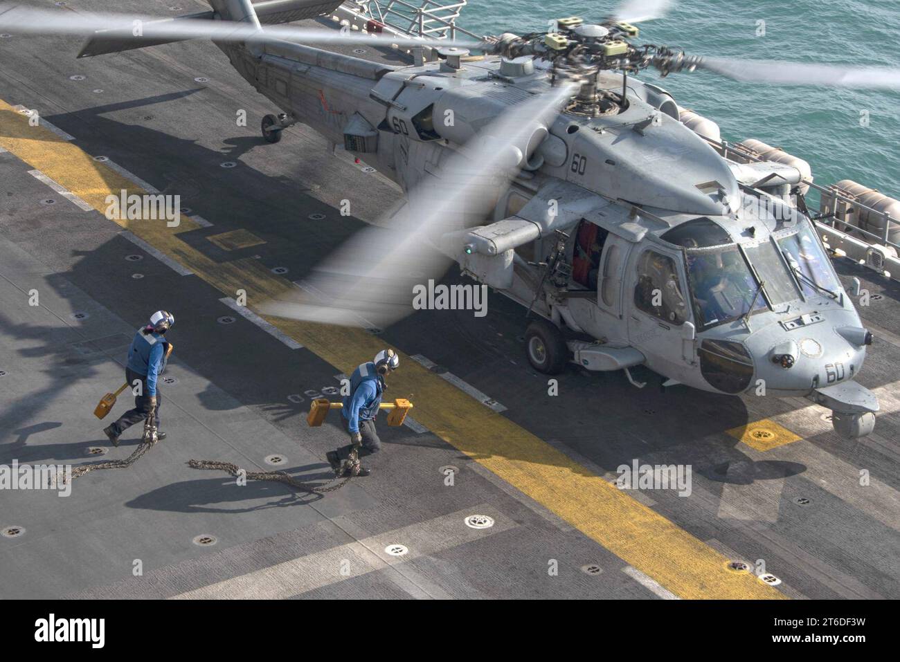 USS Essex (LHD 2) conducts flight operations in the Arabian Gulf. (51565959110) Stock Photo