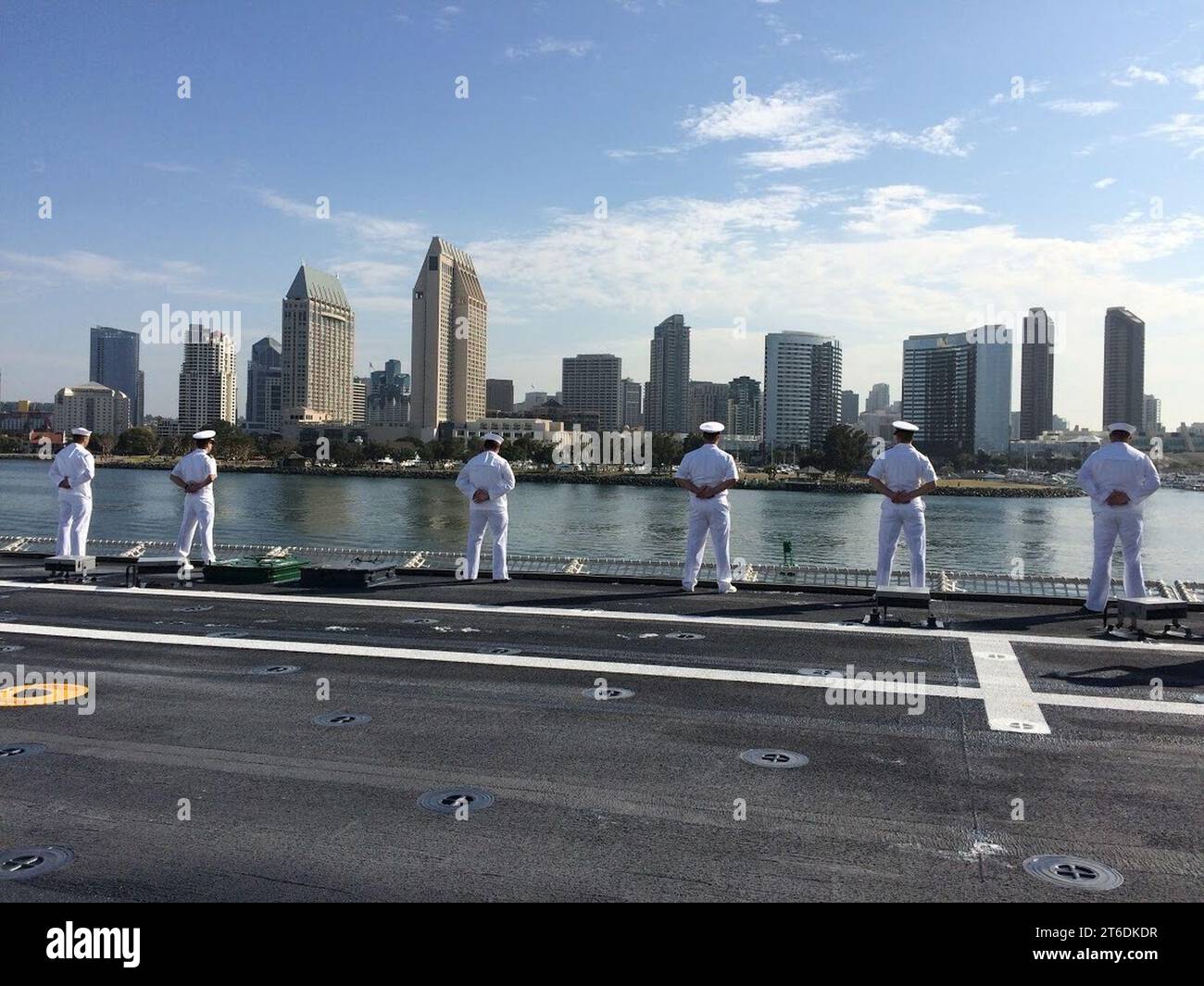 USS Gabrielle Giffords man the rails as the ship transits San Diego Bay