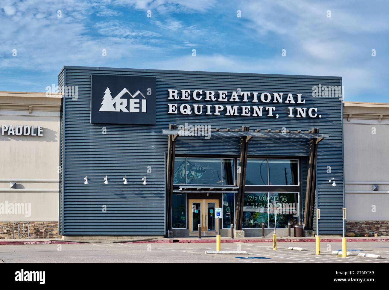 Houston, Texas USA 07-04-2023: Recreational Equipment Inc. business storefront exterior in Houston, TX. REI outdoor co-op founded in 1938. Stock Photo