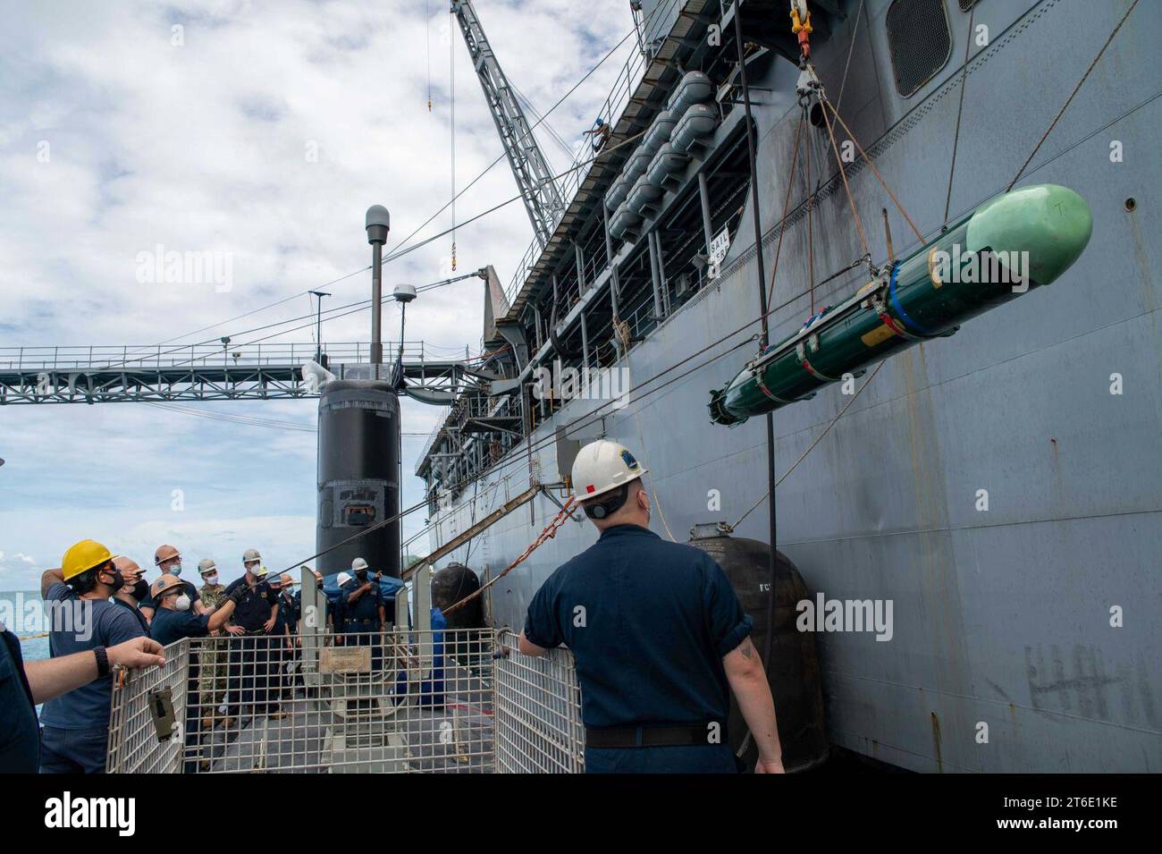 USS Hampton (SSN 767) and USS Frank Cable (AS 40) conduct a weapons handling exercise on Saipan. (51649703073) Stock Photo