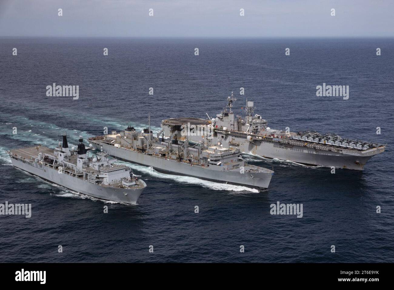USS Iwo Jima (LHD 7), USNS Supply (T-AOE 6) and HMS Albion (L 14) 210509 Stock Photo