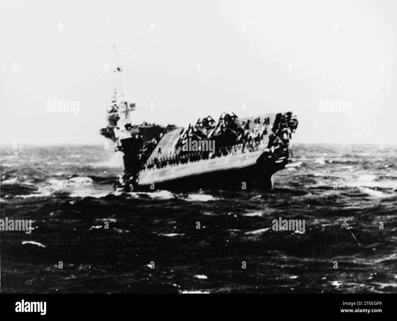 USS Lunga Point (CVE-94) rolling and pitching in heavy seas, in October ...