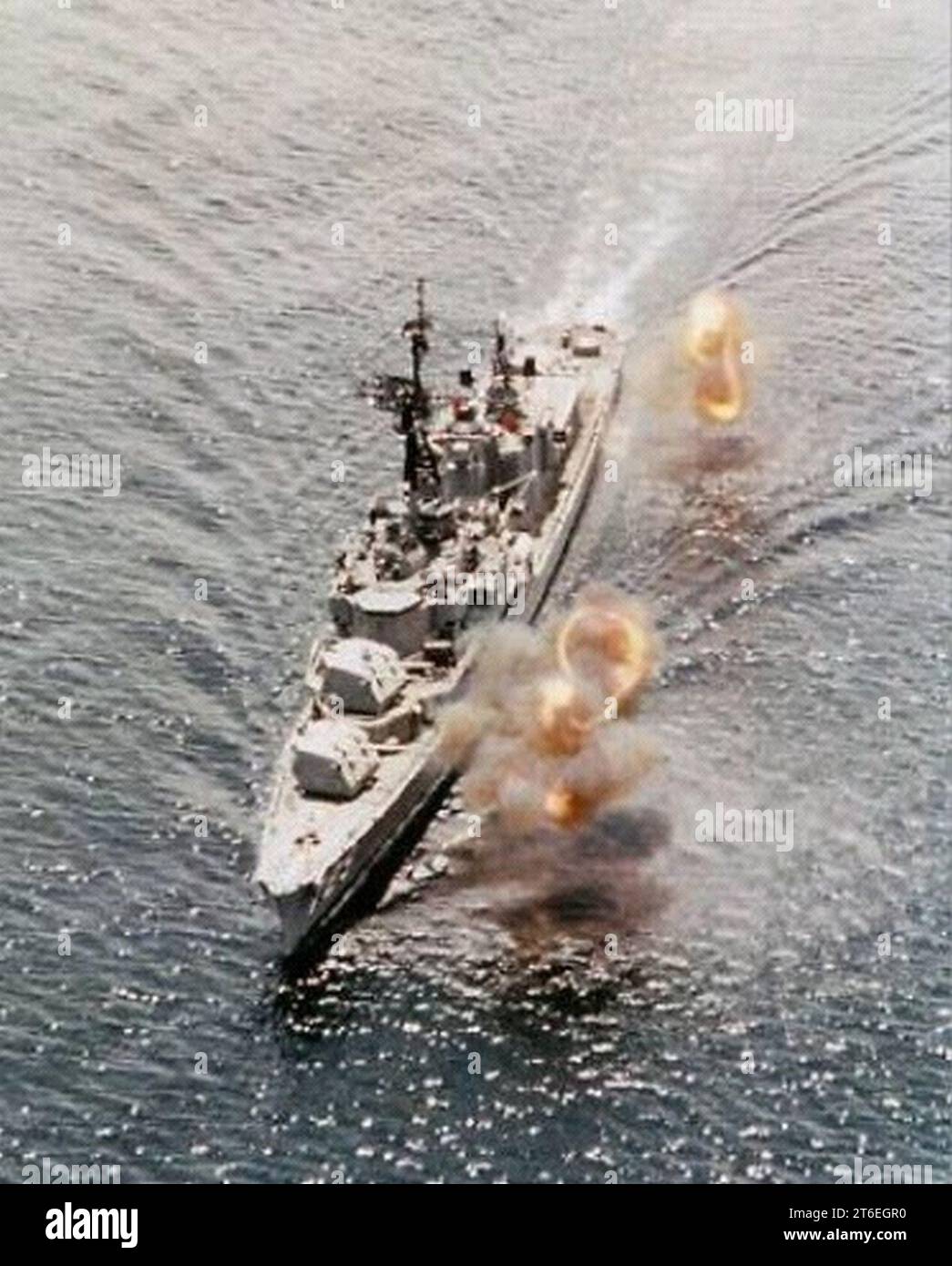 USS Lyman K. Swenson (DD-729) firing on shore targets in Vietnam, circa in 1969 Stock Photo