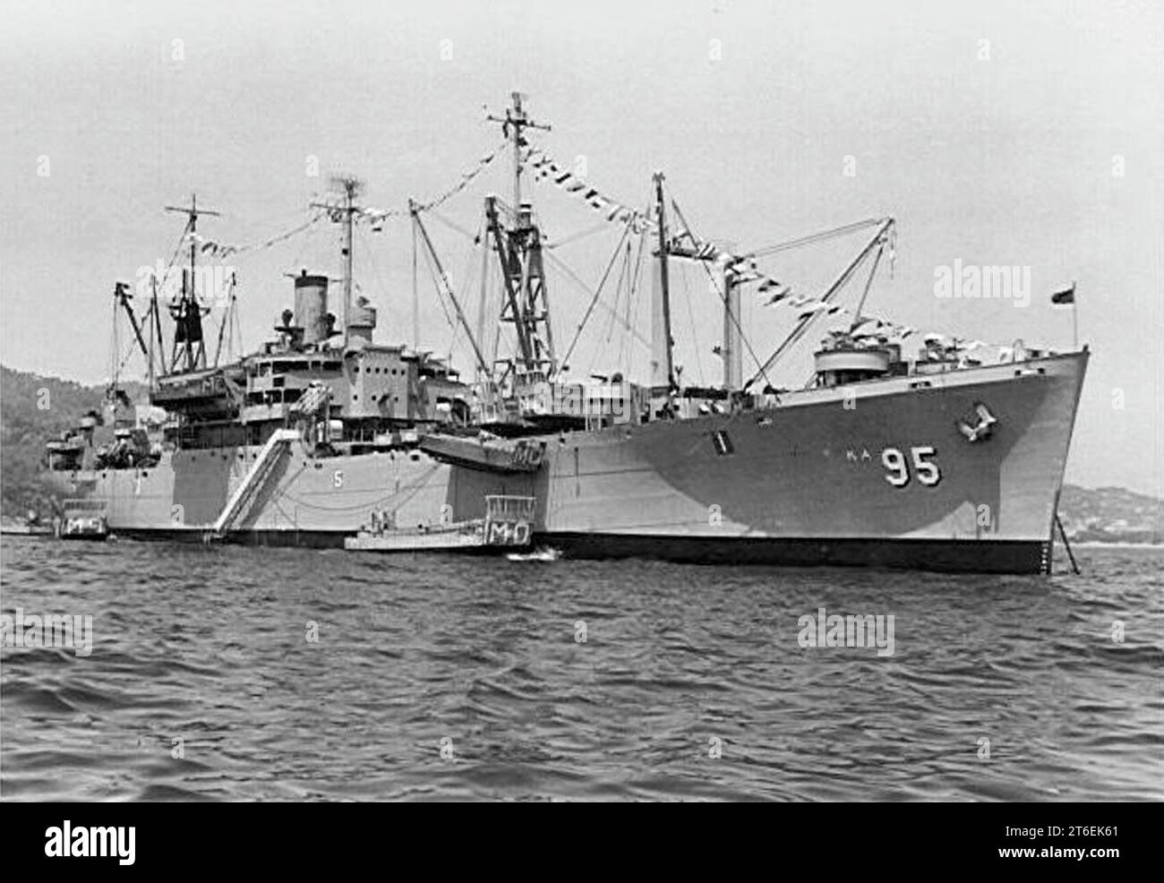 USS Marquette (AKA-95) at anchor off Oran, Algeria, circa in the early 1950s Stock Photo