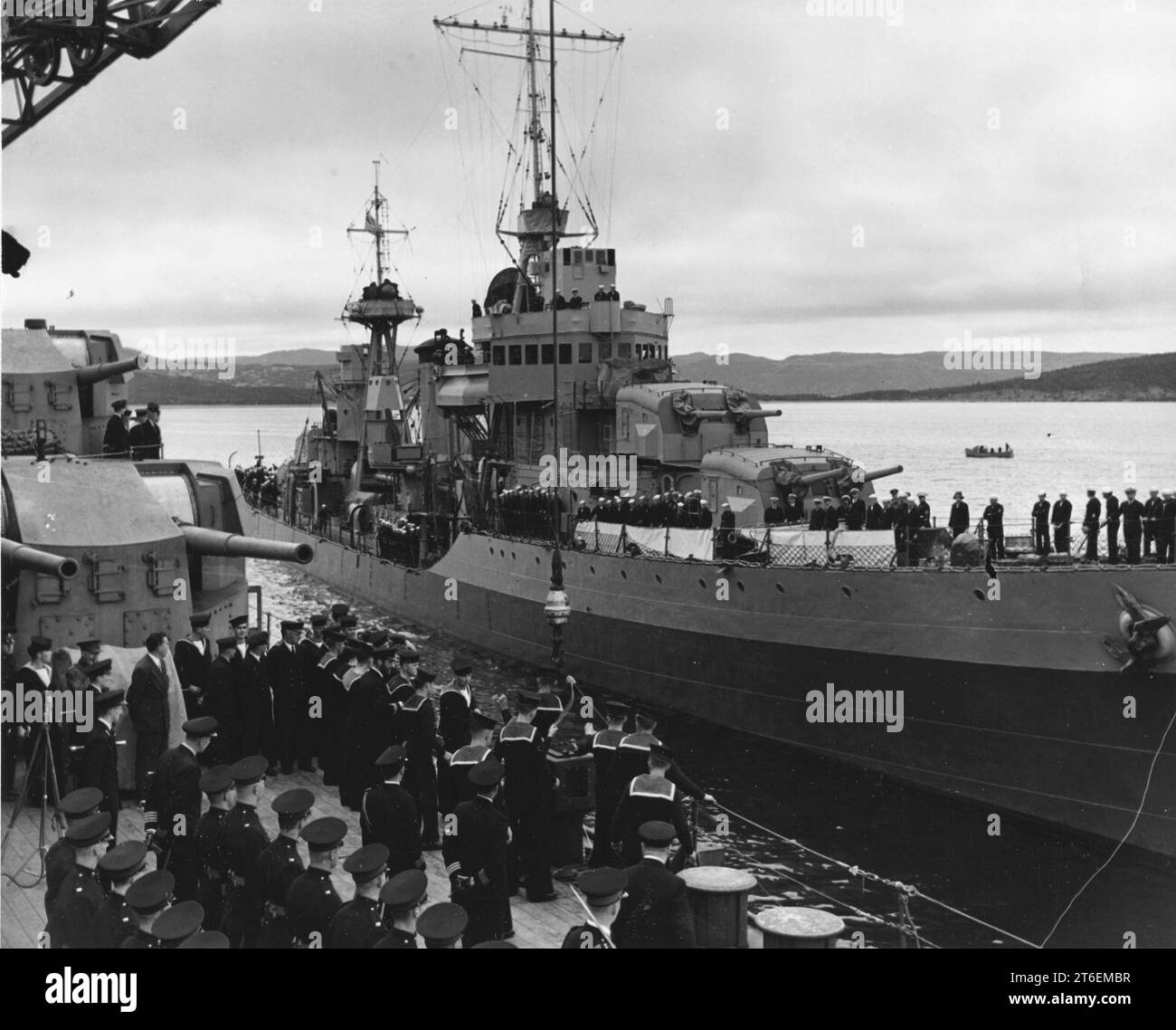 USS McDougal (DD-358) pulls alongside HMS Prince of Wales (53) in Placentia Bay, Newfoundland, 10 August 1941 Stock Photo