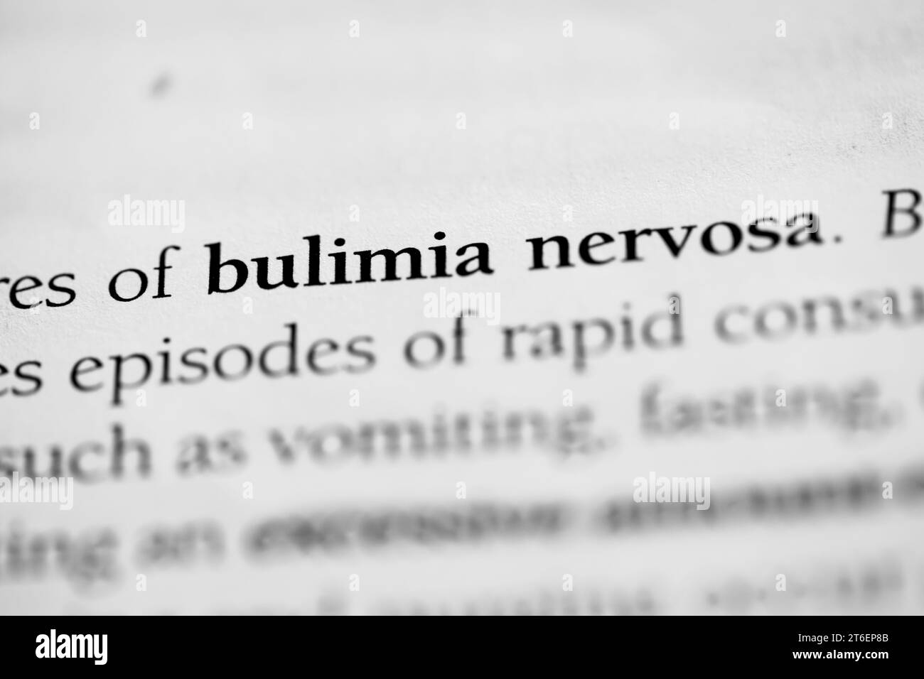 A close-up of the psychological eating disorder term 'Bulimia nervosa' on a white background Stock Photo