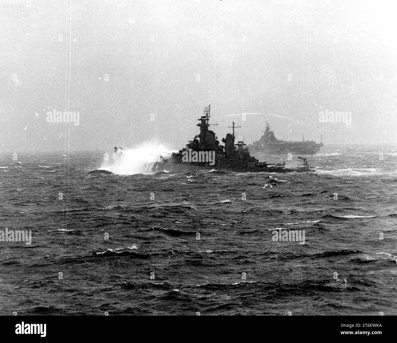USS New Jersey (BB-62) in a stiff storm Stock Photo