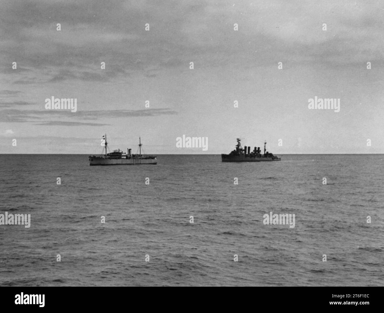 USS Omaha (CL4) with German blockade runner Odenwald, 6 November 1941