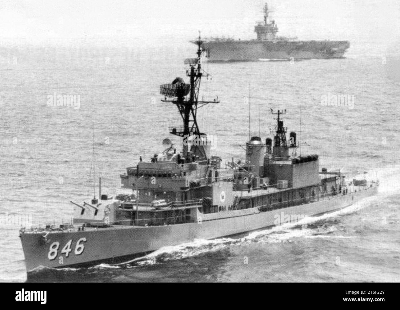 USS Ozbourn (DD-846) with USS Kitty Hawk (CVA-63) in 1963 Stock Photo
