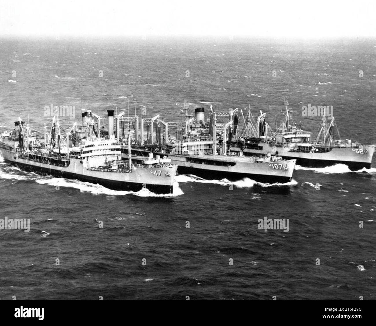 USS Passumpsic (AO107) refueling USS Neches (AO47) and USS Taluga (AO