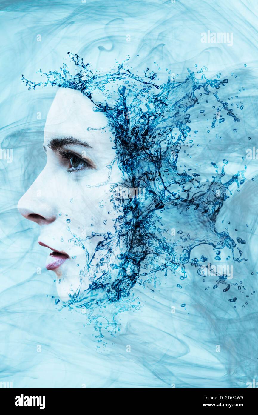 woman face with a liquid water splashing effect Stock Photo