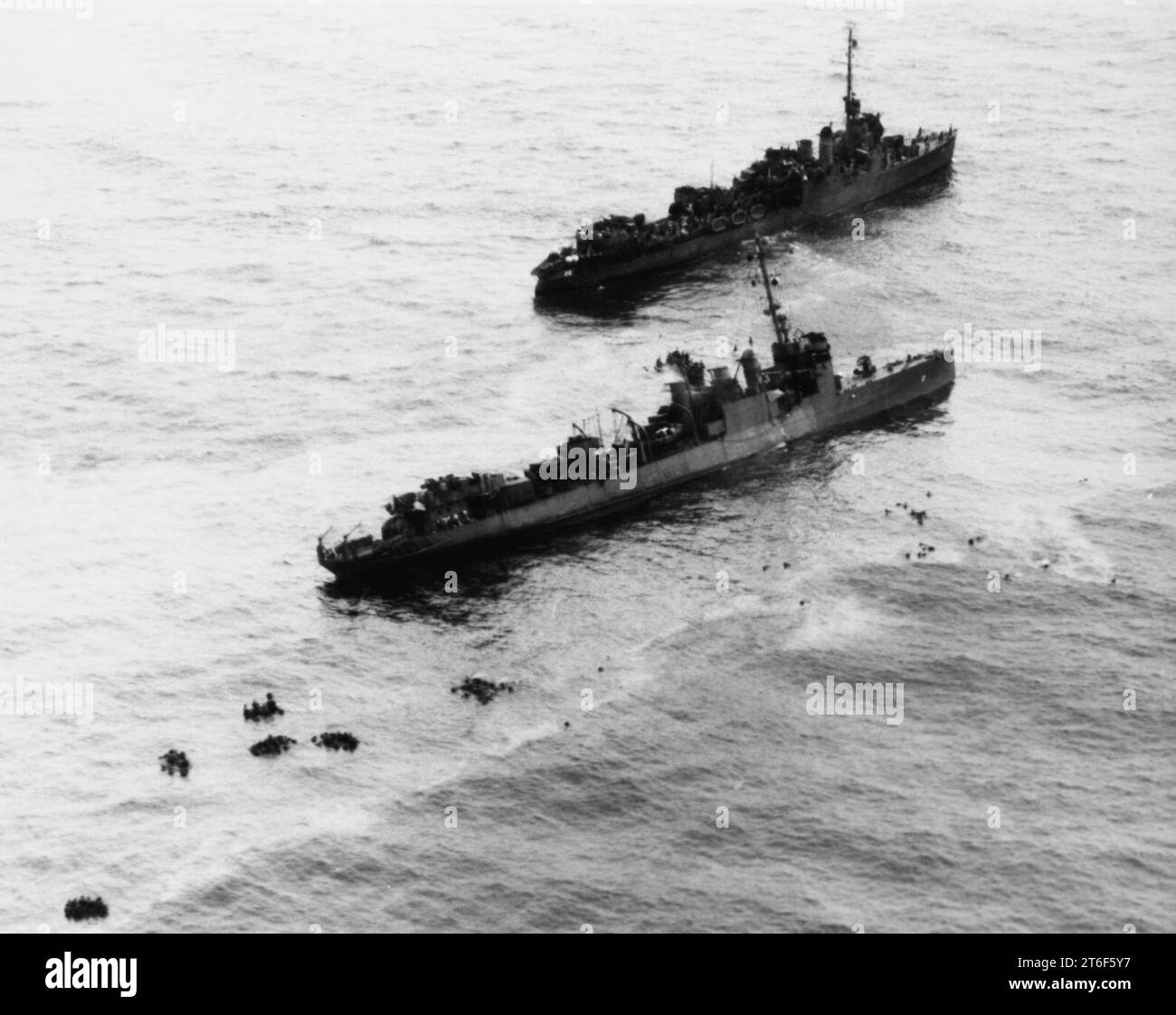 USS Preble (DM-20) stands by the sinking USS Perry (DMS-17) off Angaur ...