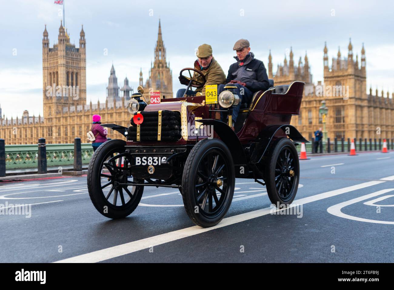 1900 Daimler car participating in the London to Brighton veteran car run, vintage motoring event passing through Westminster, London, UK Stock Photo