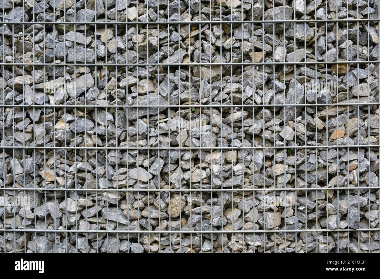 Surface of a broken rock wall Stock Photo