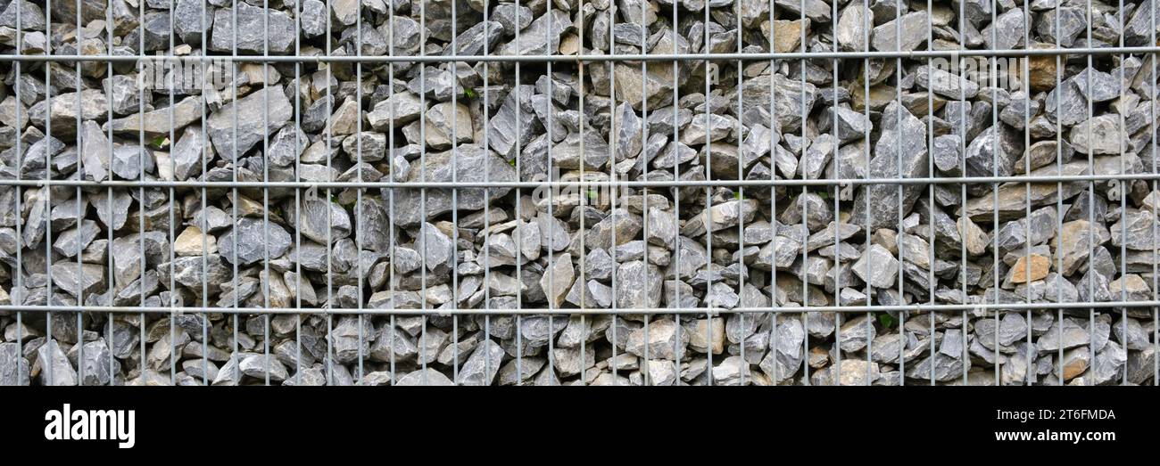 Surface of a broken rock wall Stock Photo