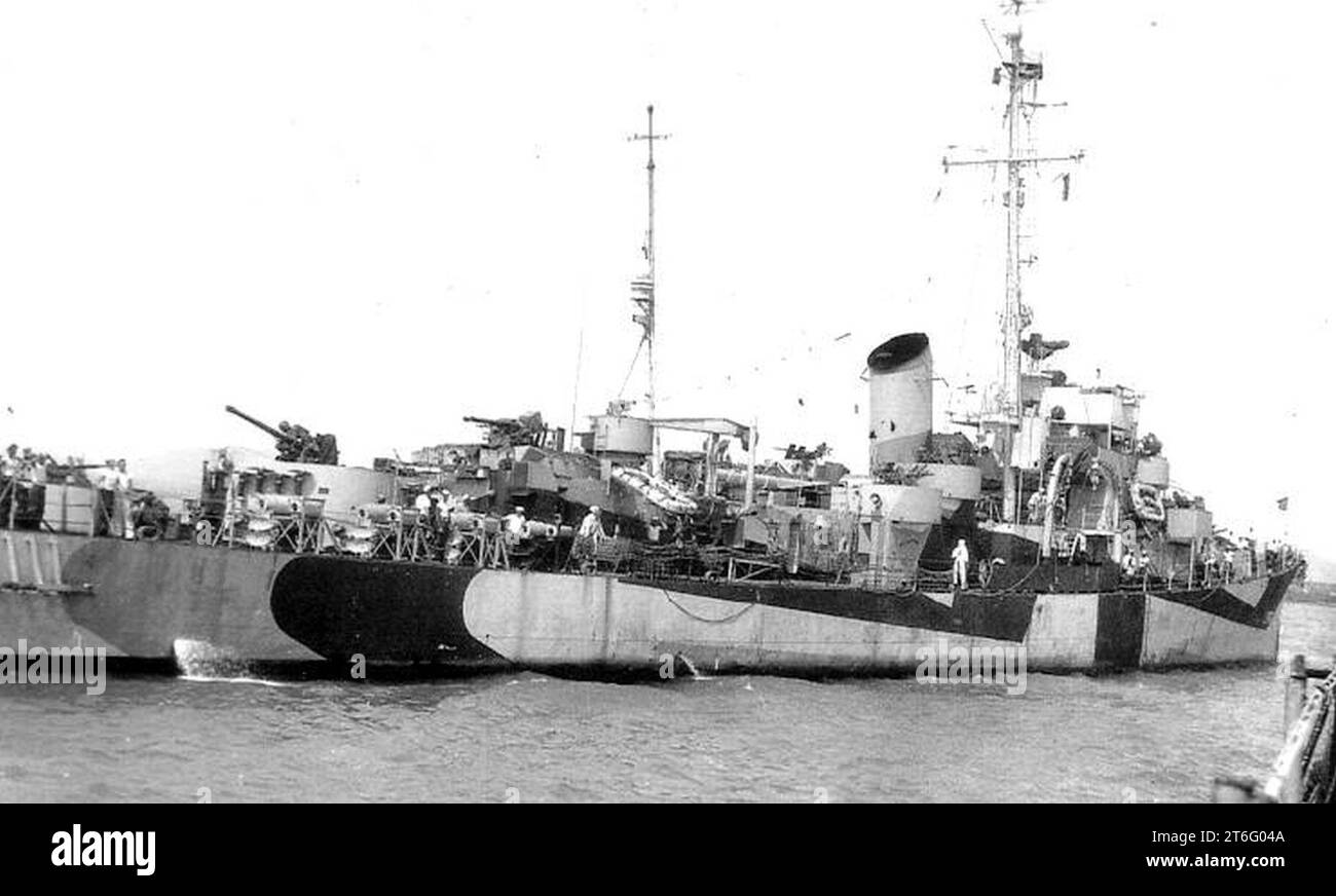 USS Tomich (DE242) docked at Norfolk, Virginia (USA), in April 1945