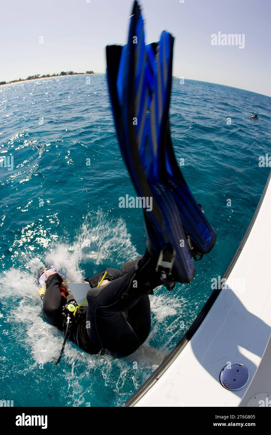 Scuba diver performs Stock Photo