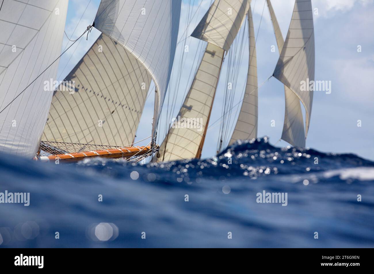 An abstract view of the full sails and bowsprit of yachts racing Stock ...