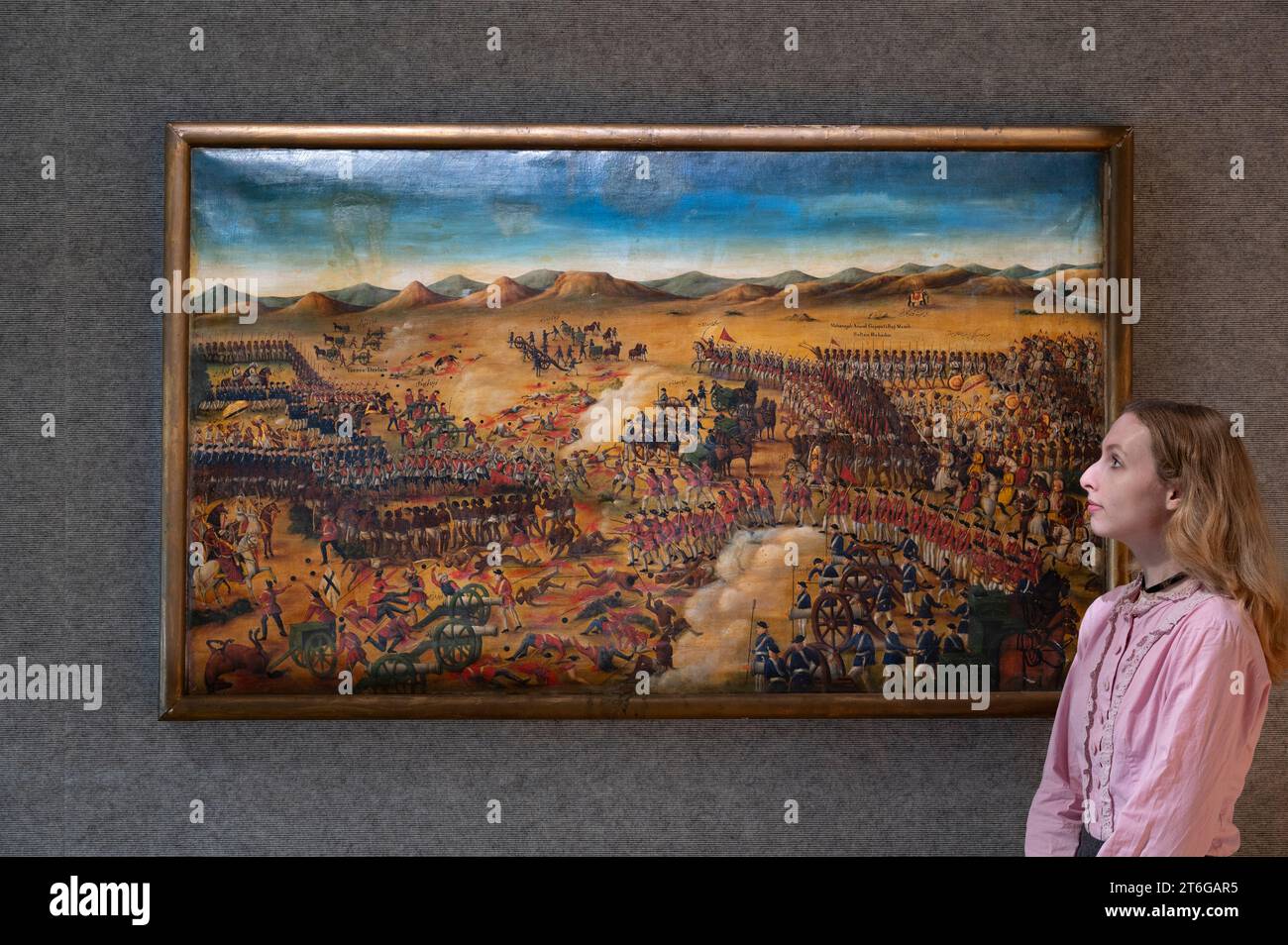 Bonhams, London, UK. 10th Nov, 2023. Preview of Islamic and Indian Art sale at Bonhams, New Bond Street, taking place on 14 November. Highlights include: Large painting depicting the Battle of Condore in December 1758, during the Third Carnatic War, with East India Company troops under Colonel Forde engaged against French troops and their allies, South India, 19th Century, estimate £30,000-50,000. Credit: Malcolm Park/Alamy Live News Stock Photo