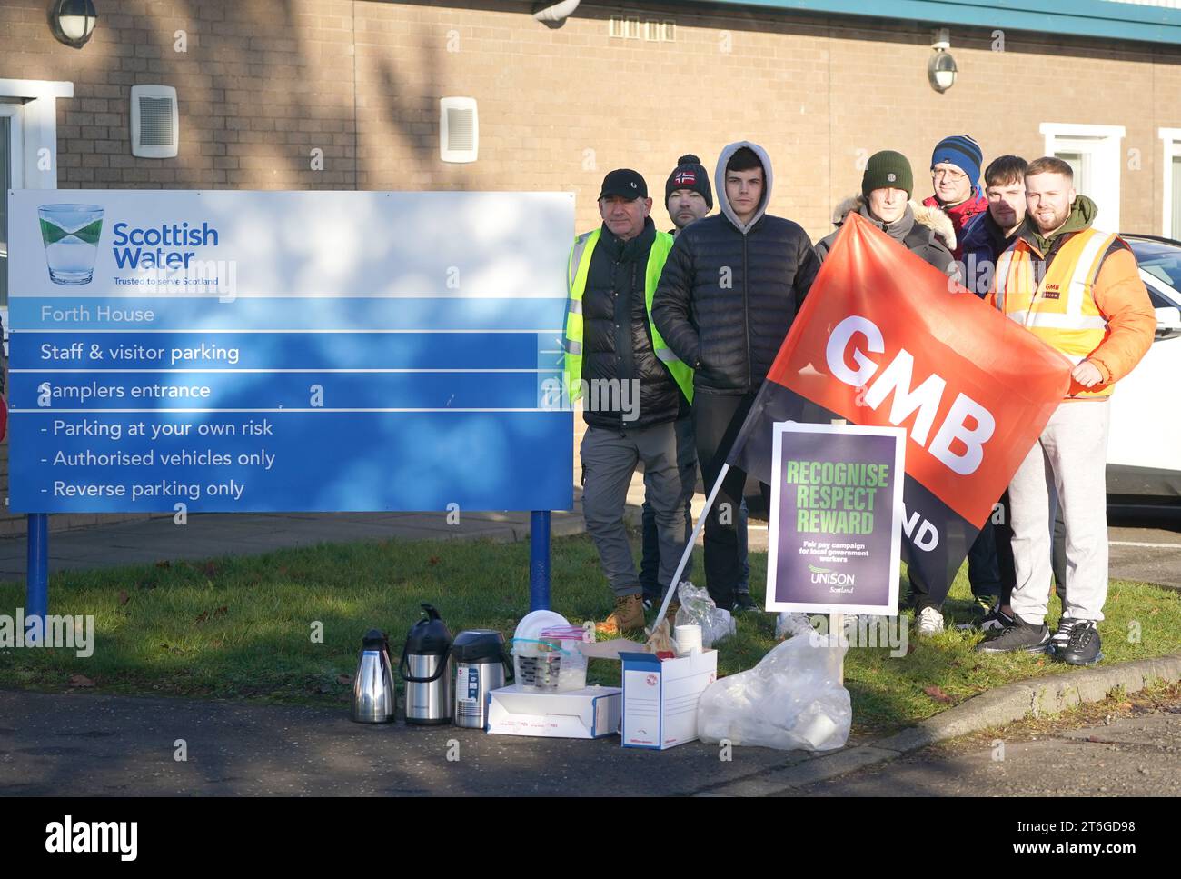 Members of the Unite, Unison and GMB unions on the picket line at