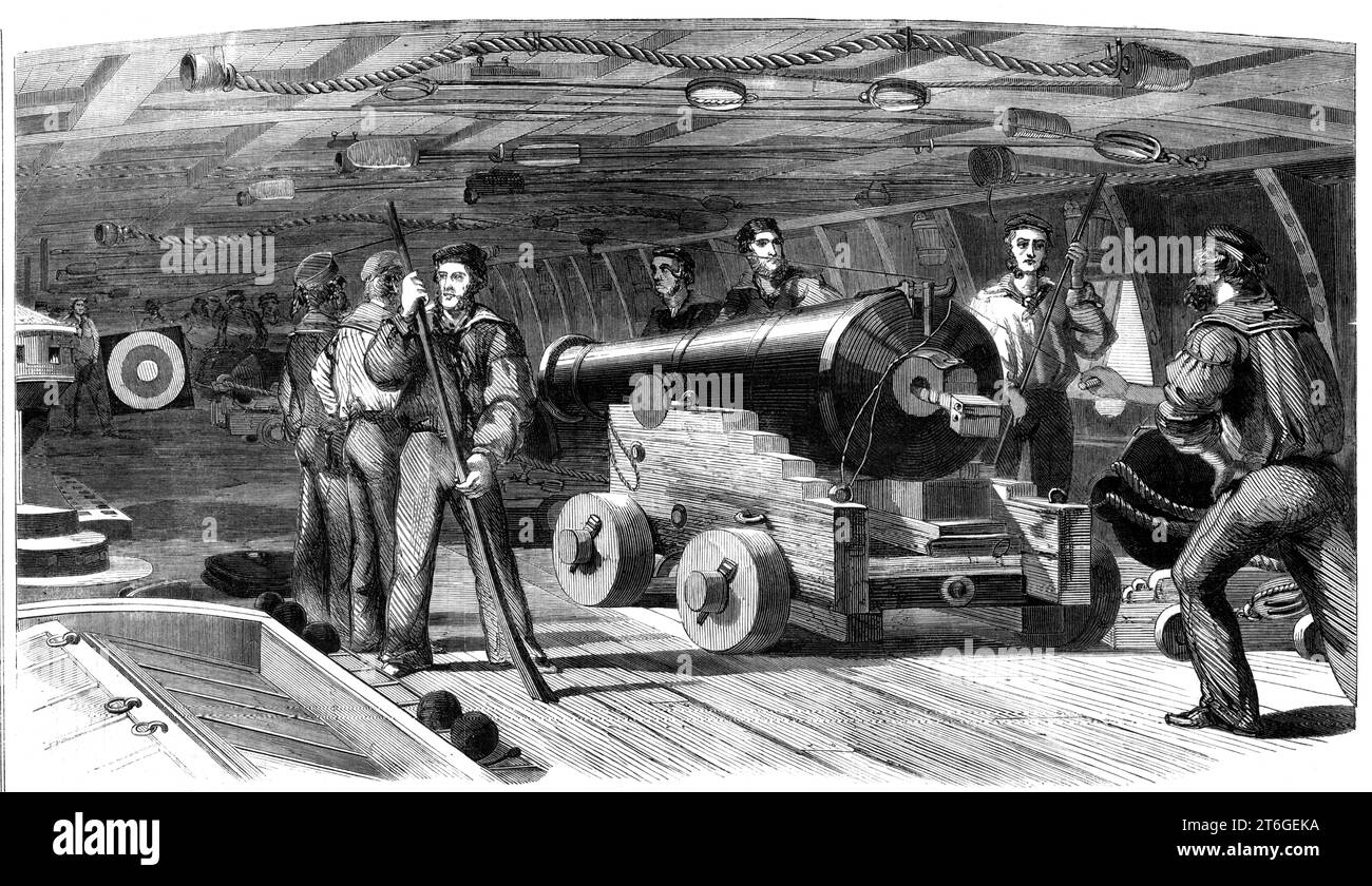 Gun practice on board H.M.S. &quot;Brilliant&quot;, 1860. British seamen in the Naval Reserve: scene showing '...a gun's crew at lever target-practice - in the act of laying the gun for the &quot;bull's-eye&quot; on the target preparatory to its being set in motion. Each volunteer has to fire a certain number of shots at the target during his period of drill, and he undergoes the same instruction as if he were at actual practice at a target afloat'. From &quot;Illustrated London News&quot;, 1860. Stock Photo