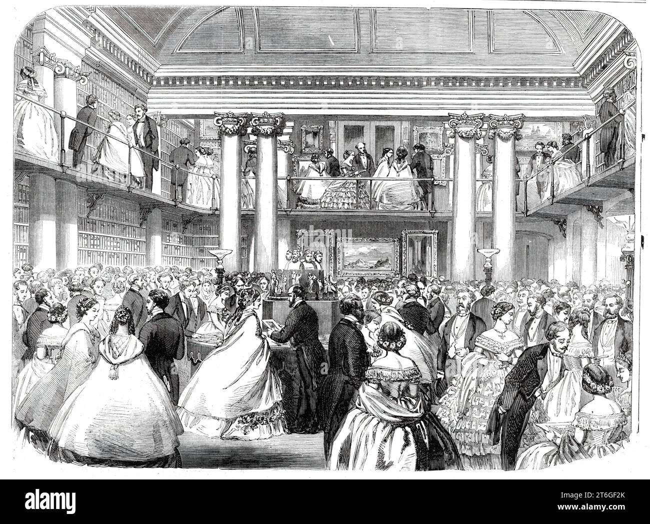 Literary reunion in Mr. Mudie's new hall, 1860. 'On the evening of Monday week Mr. and Mrs. C. E Mudie received a vast number of literary and artistic friends, on the occasion of the opening of the new hall of the library, New Oxford-street, [London]. The company included the representatives of all classes of literature, science, and art...The walls were decorated with a variety of pictures, the property of Mr. Mudie...The vocalists who were engaged were Miss Palmer, Miss Eliza Hughes, Signor Nappi, Messrs. Aspa and Kenny. In the centre of the hall were exhibited, on a circular dais, a number Stock Photo