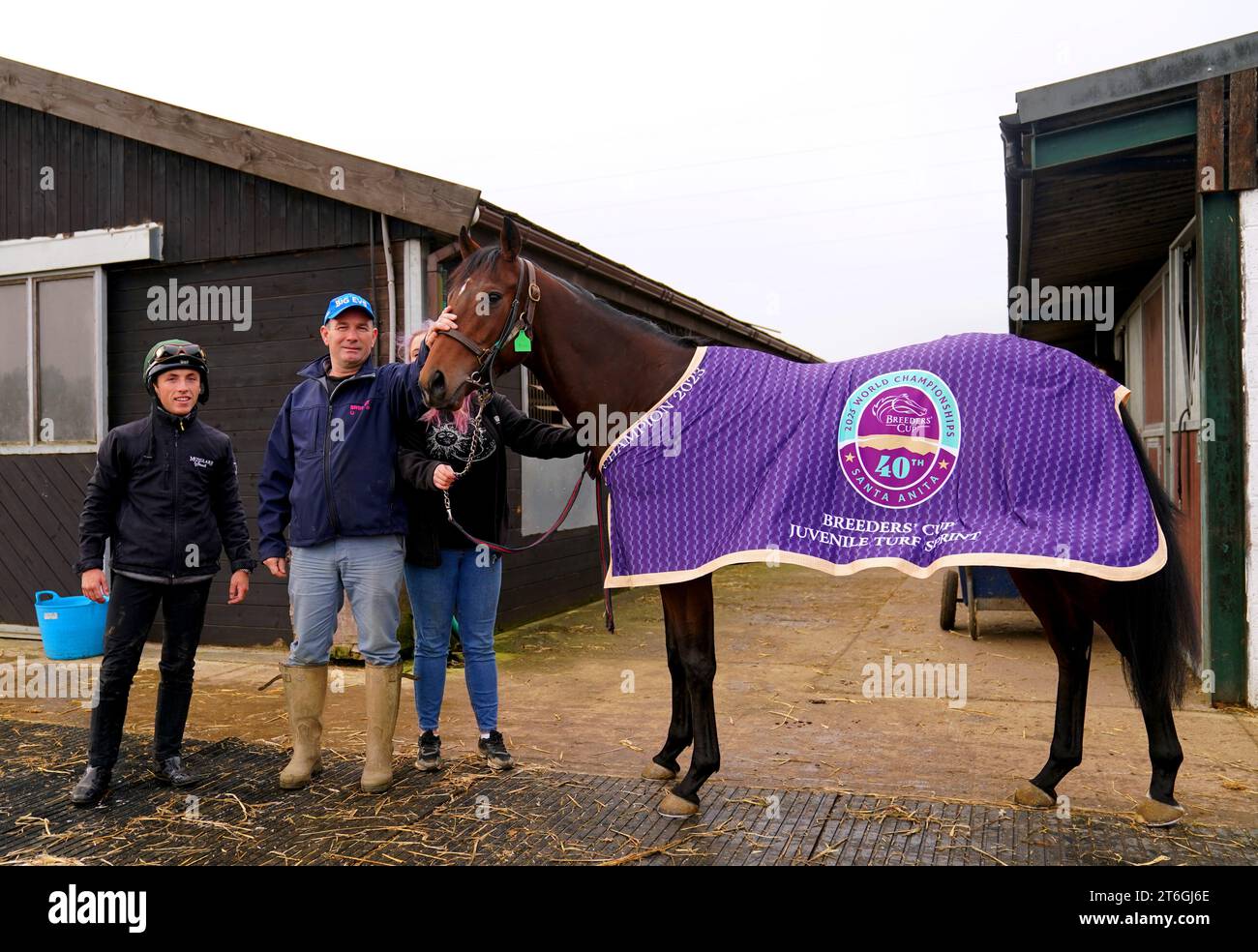 Big Evs with trainer Mick Appleby and jockey Frederick Larson during a visit to Mick Appleby