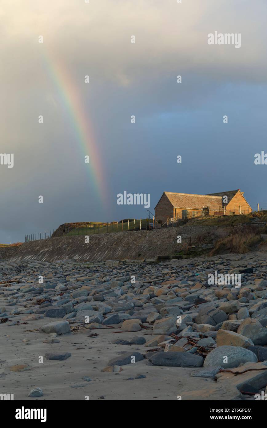 Sea wall protecting Skara Brae historic site, Orkney Islands Stock Photo