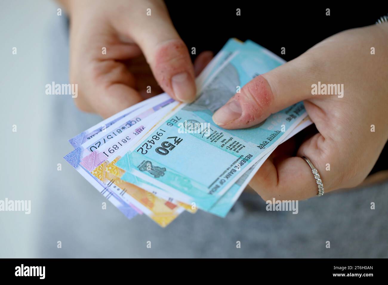 Woman hand with indian rupees bills close up. Concept of financial ...