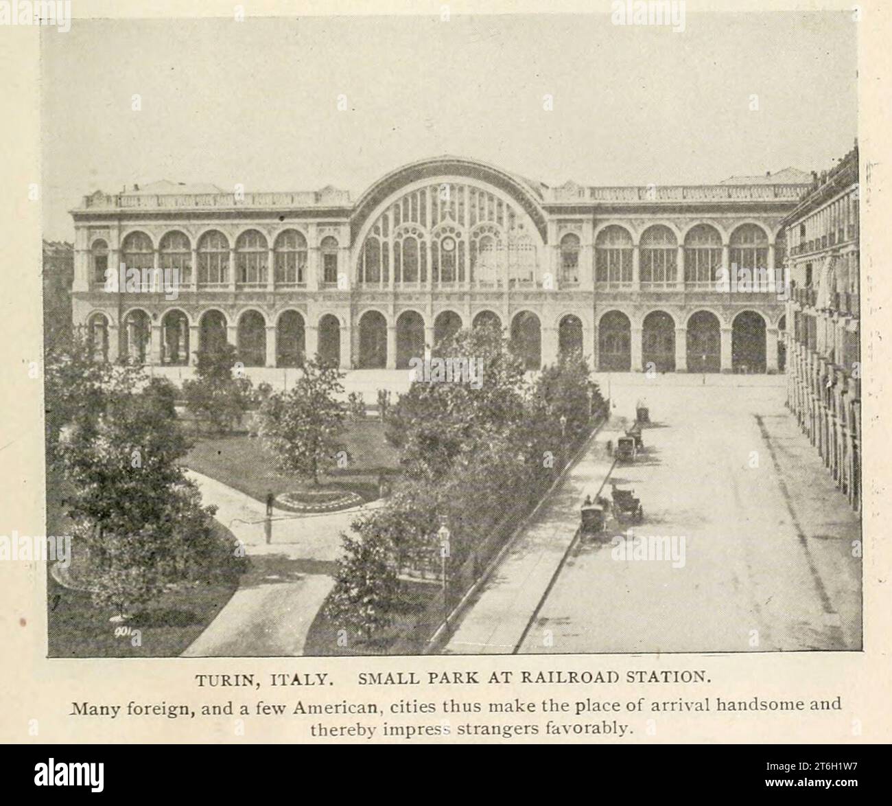 TURIN, ITALY, SMALL PARK AT RAILROAD STATION. Many foreign, and a few American, cities thus make the place of arrival handsome and thereby impress strangers favorably. from the Article THE POSITIVE VALUE OF QUIET AND BEAUTIFUL STREETS. By J. W. Howard. from The Engineering Magazine DEVOTED TO INDUSTRIAL PROGRESS Volume XII October 1896 to March 1897 The Engineering Magazine Co Stock Photo