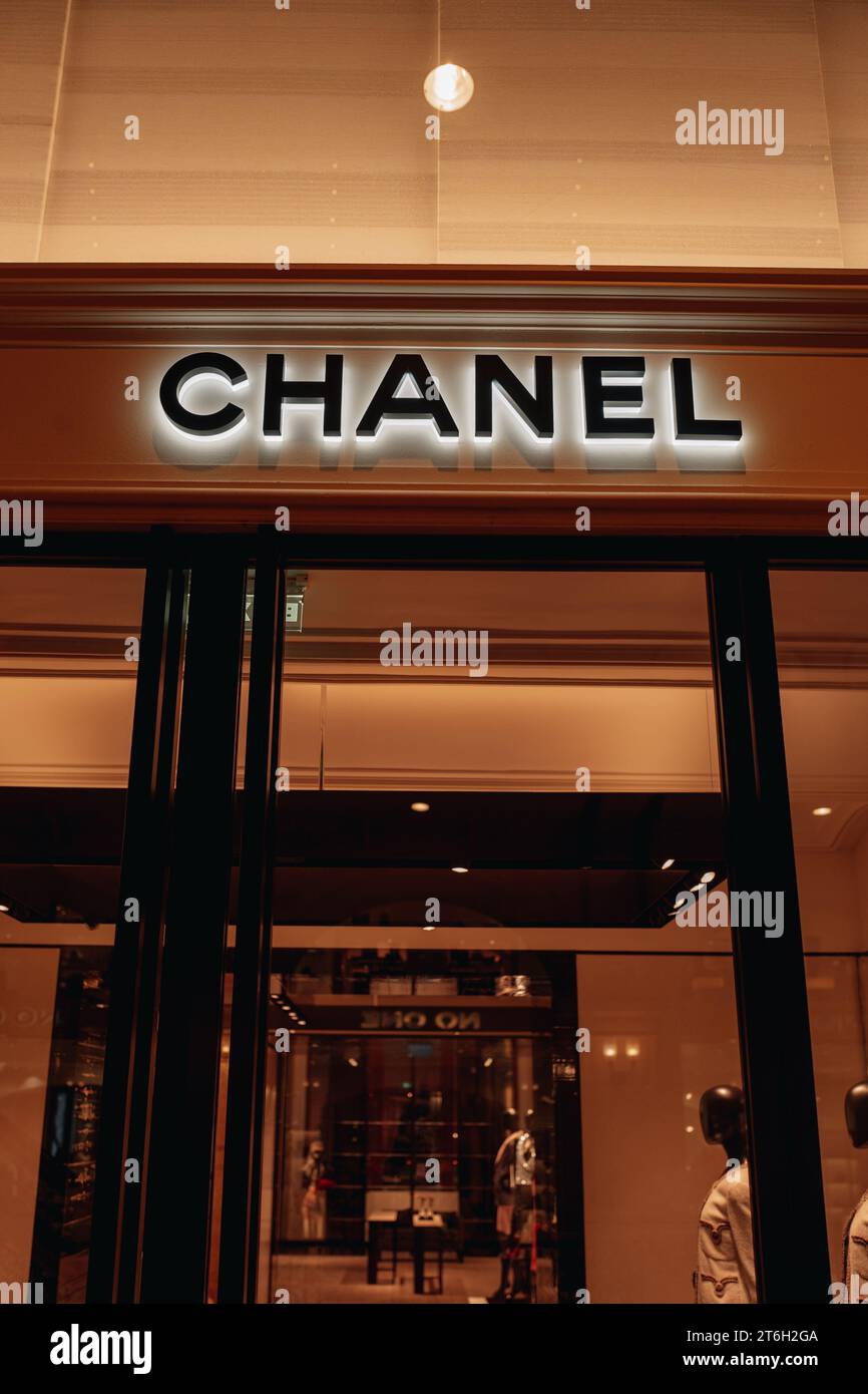 Classic Chanel logotype.Luxury boutique showcase. Chanel is a fashion house founded in 1909 specialized in haute couture goods. Stock Photo