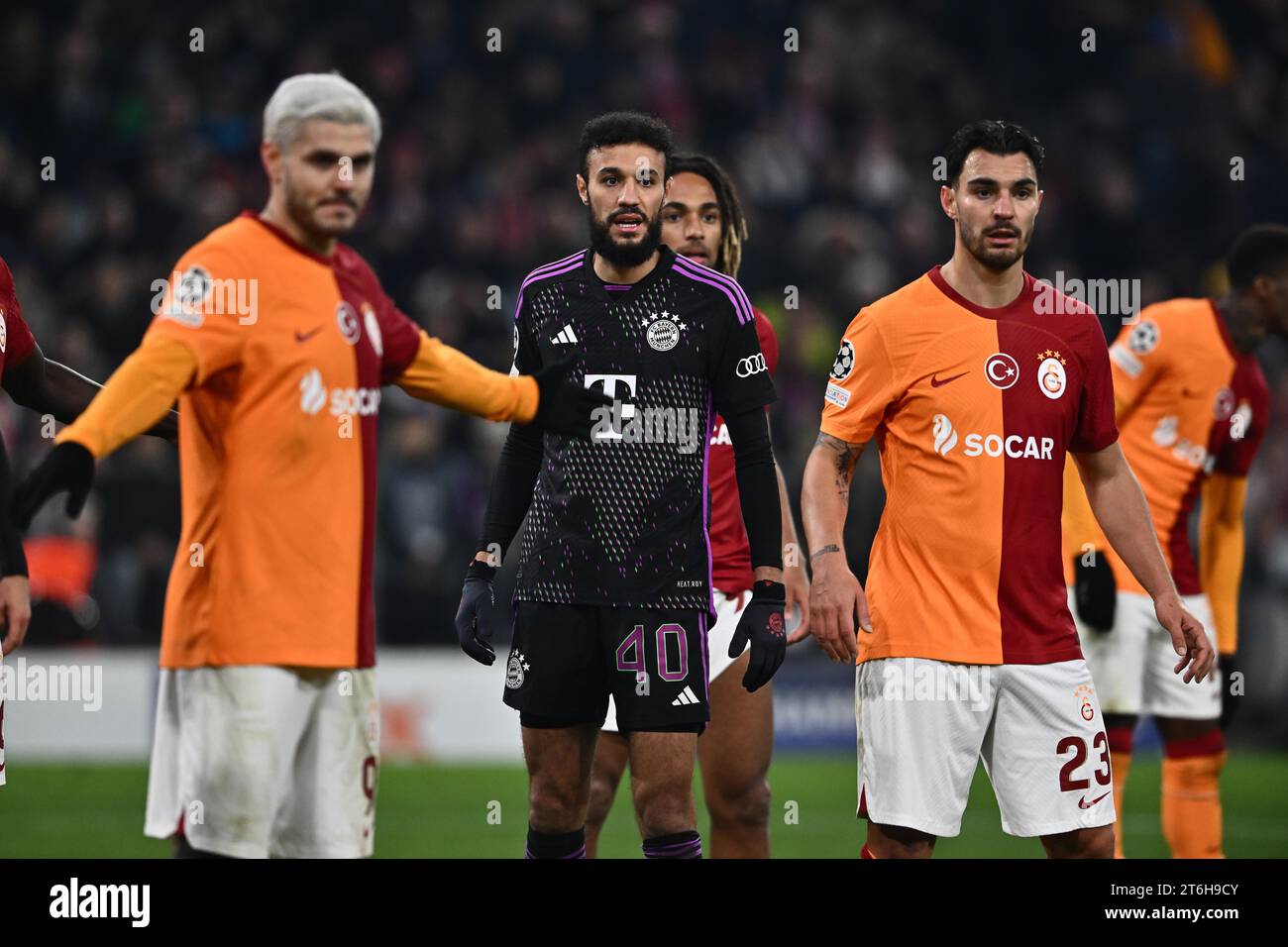 MUNICH, GERMANY - NOVEMBER 8: Noussair Mazraoui of Bayern Munich and Kaan Ayhan of Galatasaray during the UEFA Champions League match between FC Bayer Stock Photo